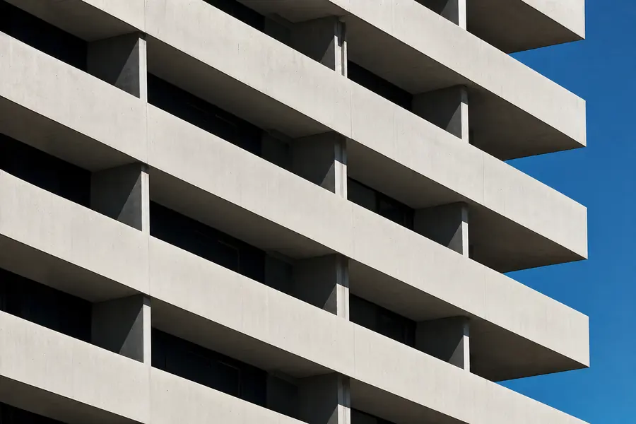 Repeating balcony slabs on a modern building, abstract architectural detail