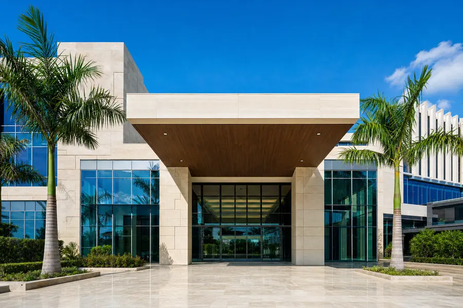 Modern glass and stone office building entrance in South Florida