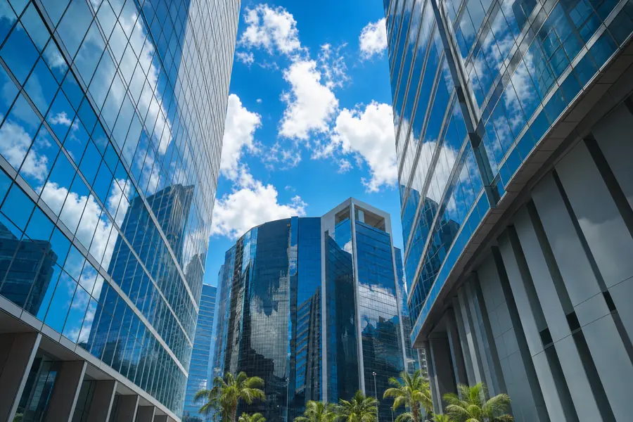 Glass office towers seen from street level in Miami, Florida