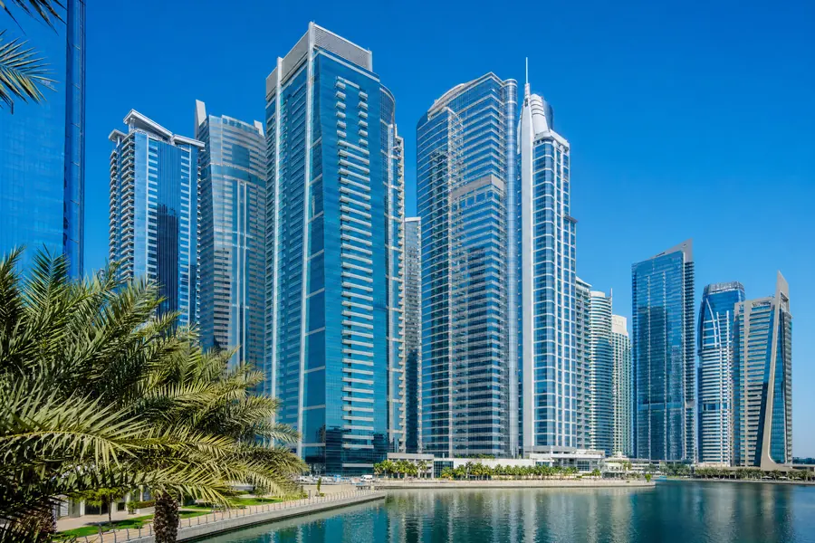 Dense glass office towers seen across water in Miami