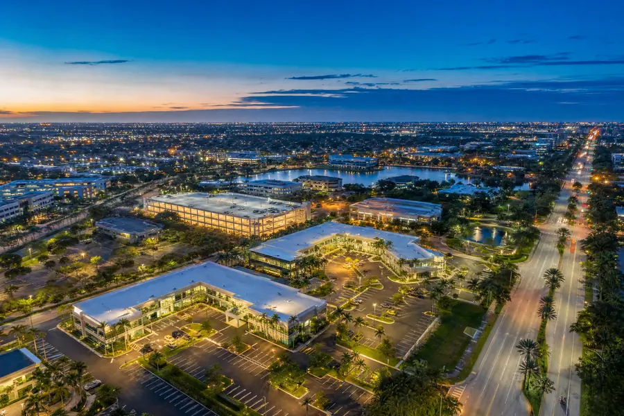 Aerial dusk view of a South Florida commercial corridor