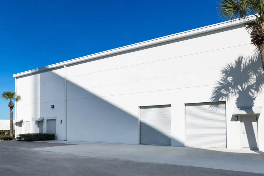 Midday sun and shadow on a South Florida industrial building