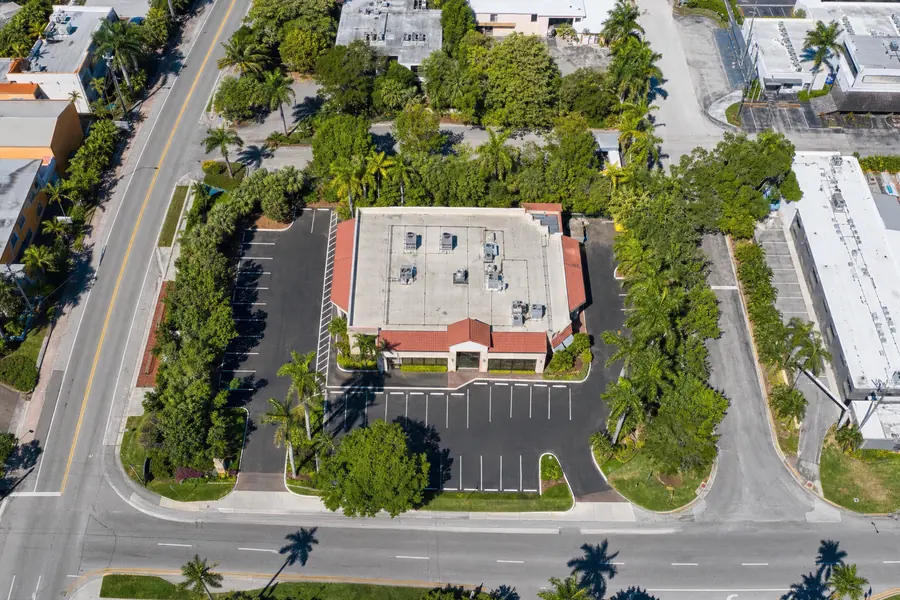 Aerial view of a single commercial parcel within its block